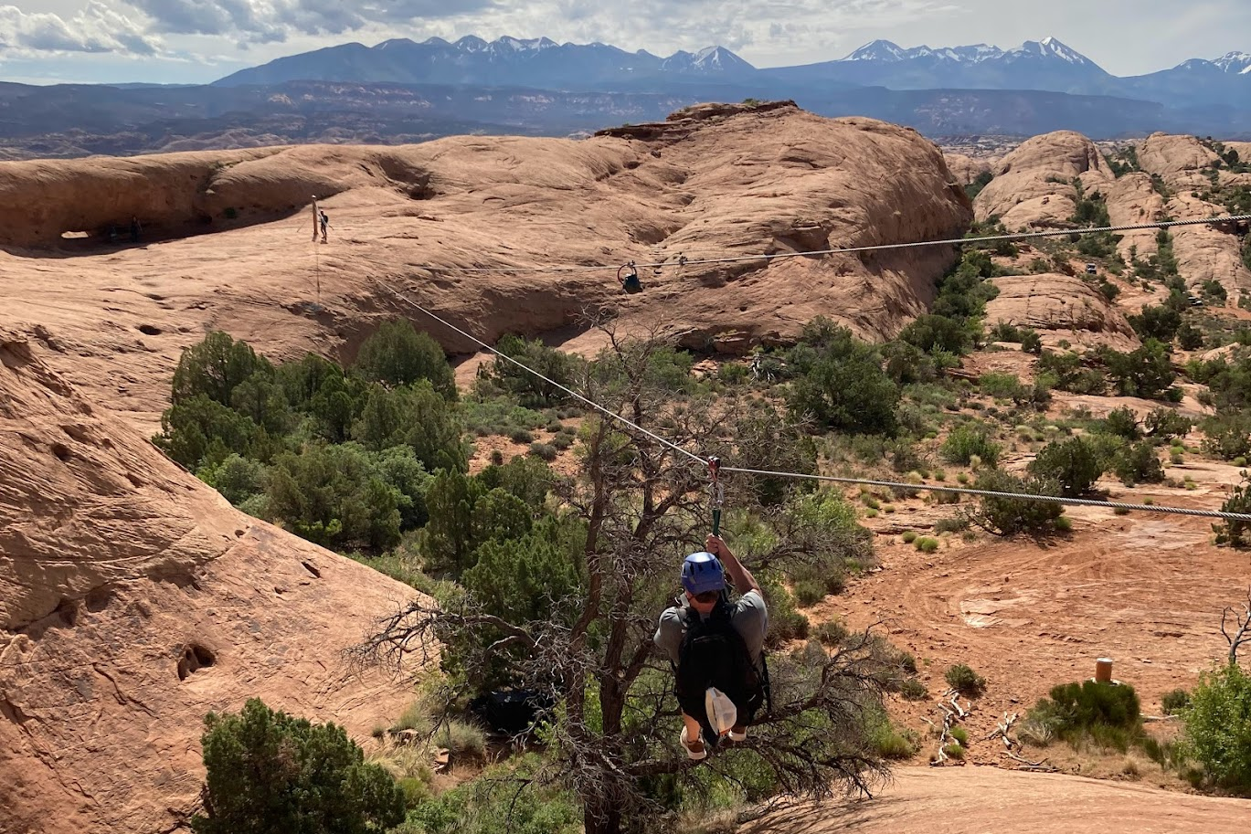 Person zip lining in Moab, Utah