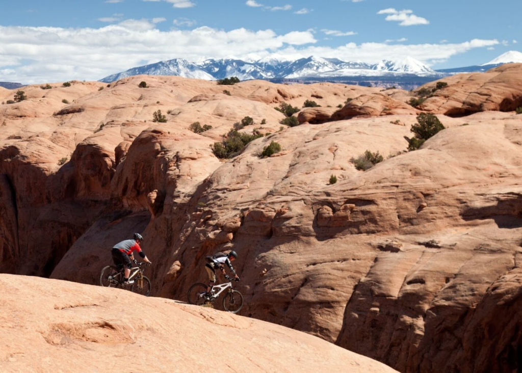 Two people mountain biking in Moab, Utah